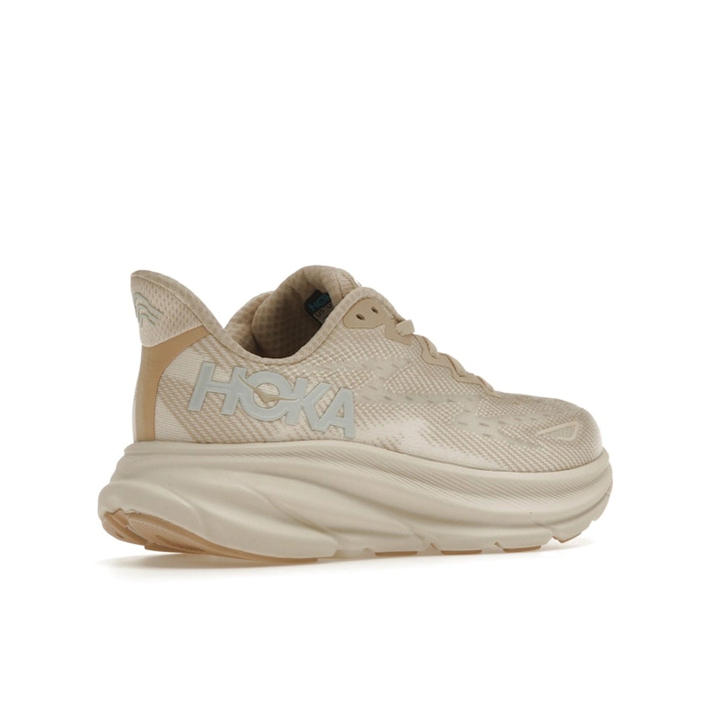 Hoka One One Clifton 9 sneakers for women, back view, model 1127896-SSEG, in shifting sand color with a comfortable fit.