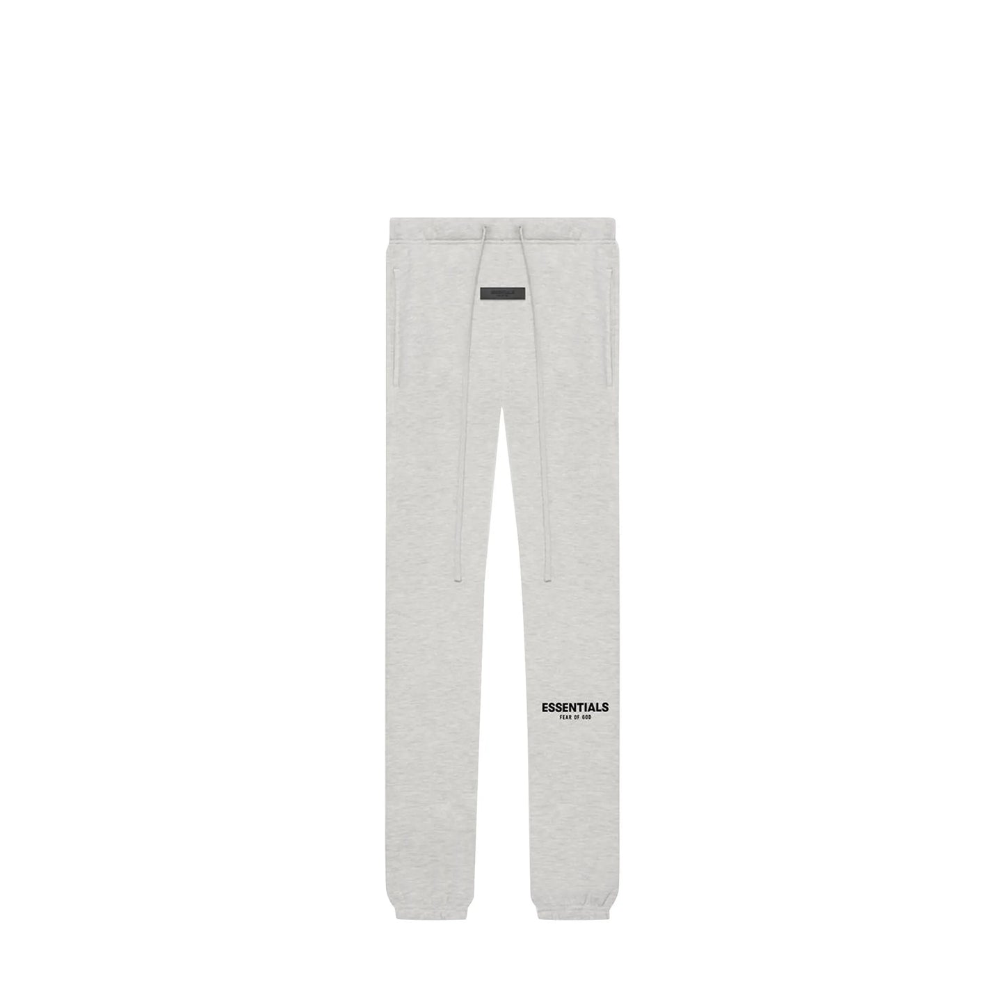 Fear of God Essentials Sweatpants, front view, in Light Oatmeal with tonal logo print.