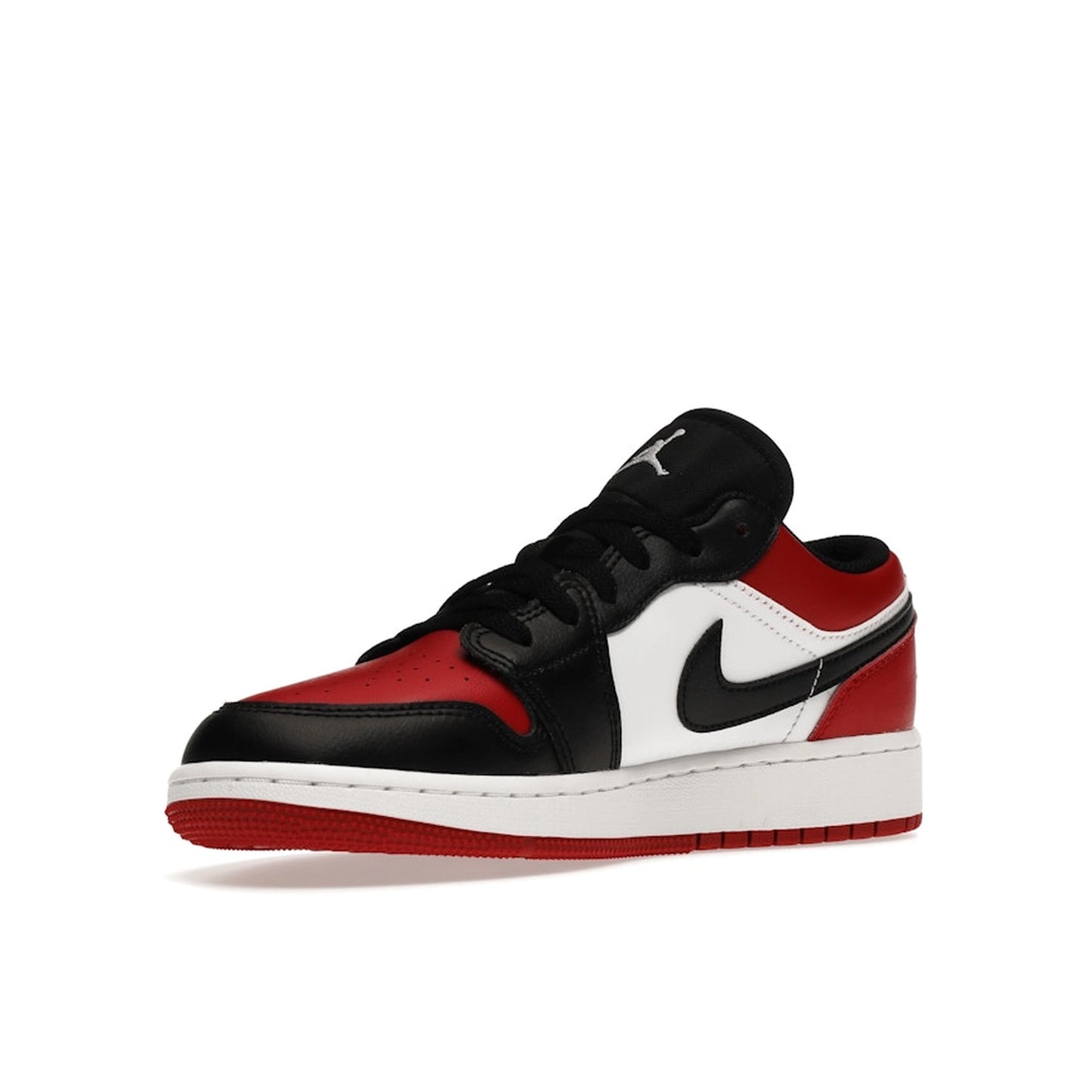 Jordan 1 Low GS sneakers, front view, in black, red, and white bred toe colorway.