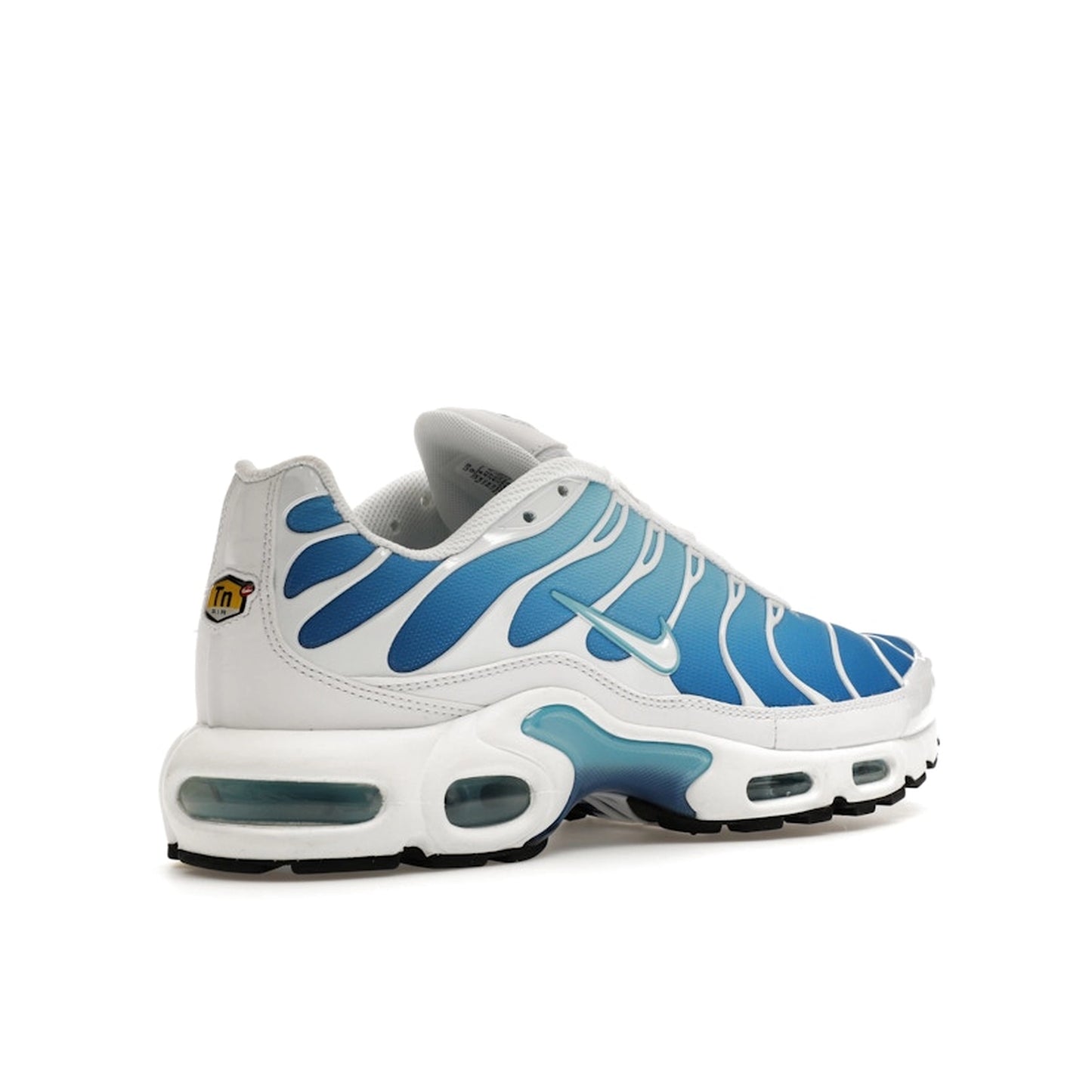 Nike Air Max Plus sneakers, back view, model 852630-411, in sky blue with black accents.