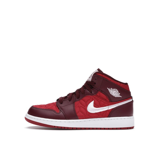 Jordan 1 Mid SE Red Quilt GS sneakers, side view, in red with quilted details.