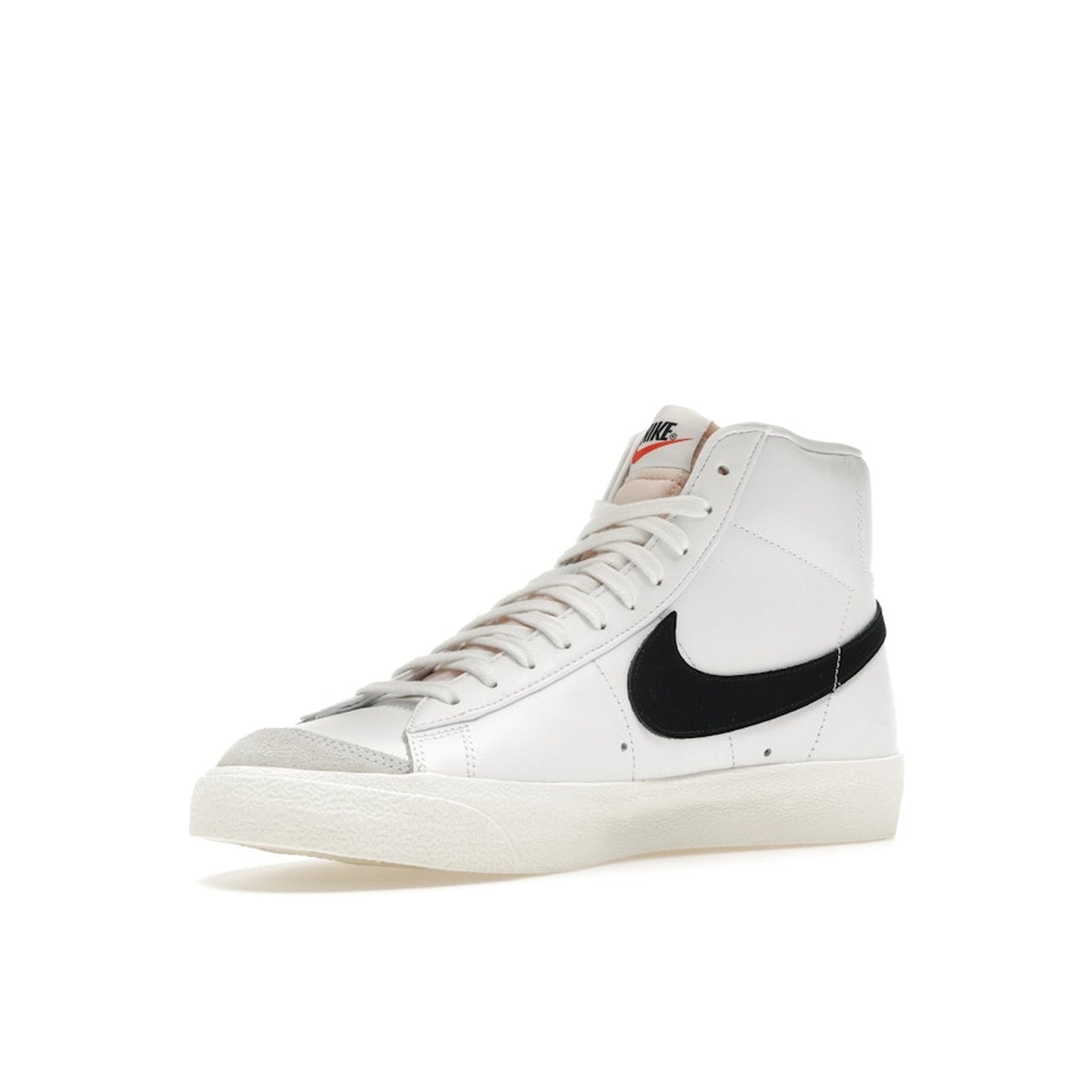 Nike Blazer Mid ’77 Vintage sneakers, front view, in white with black swoosh.