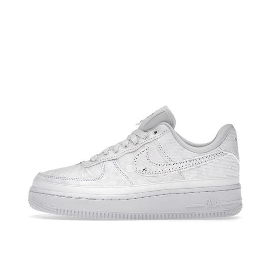 Nike Air Force 1 LX Tear Away Women's sneakers, side view, model CJ1650-101, in white with red tear-away swoosh.