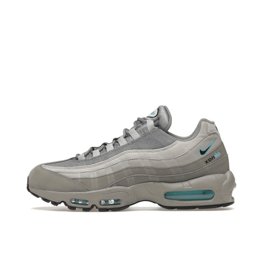 Nike Air Max 95 Retro Logo, side view, in layered grey tones with aqua blue accents.