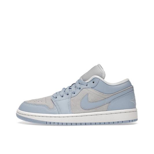 Jordan 1 Low, side view, in football grey with contrasting aluminum tones.