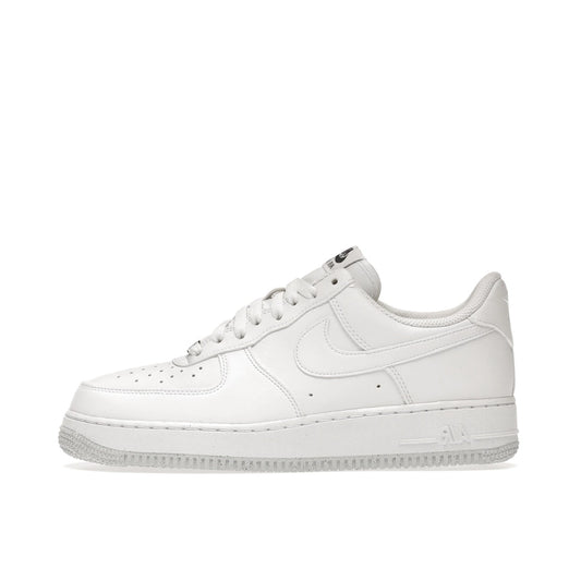 Nike Air Force 1 Low Next Nature Women's sneakers, side view, model DC9486-101, in white with metallic grey details.