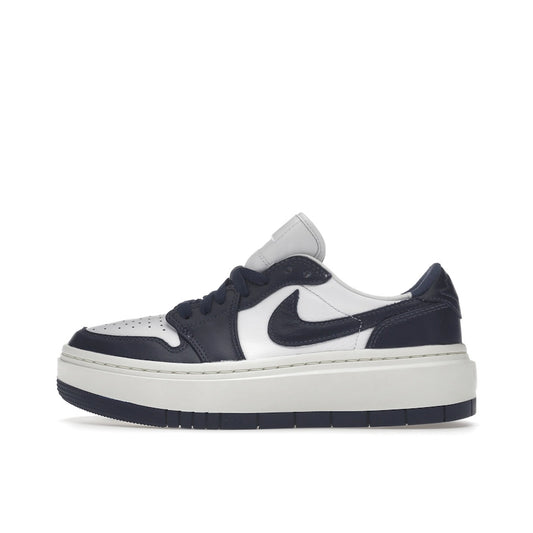 Jordan 1 Elevate Low Women’s sneakers, side view, in midnight navy and white.