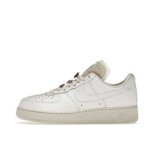 Nike Air Force 1 Low Prm Jewels White, side view, featuring white leather and chrome lace jewels.