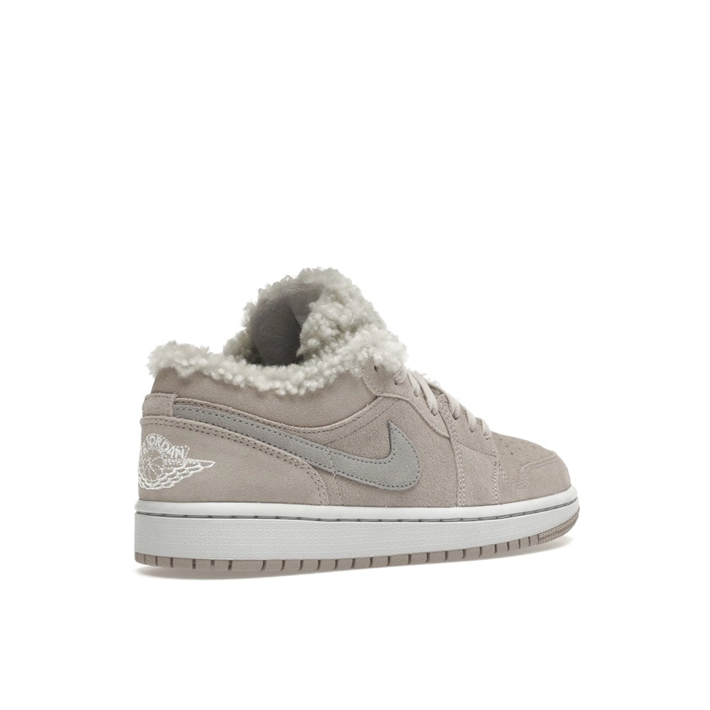 Jordan 1 Low SE Sherpa Fleece sneakers, back view, model DO0750-002, women's, in black with fleece accents.