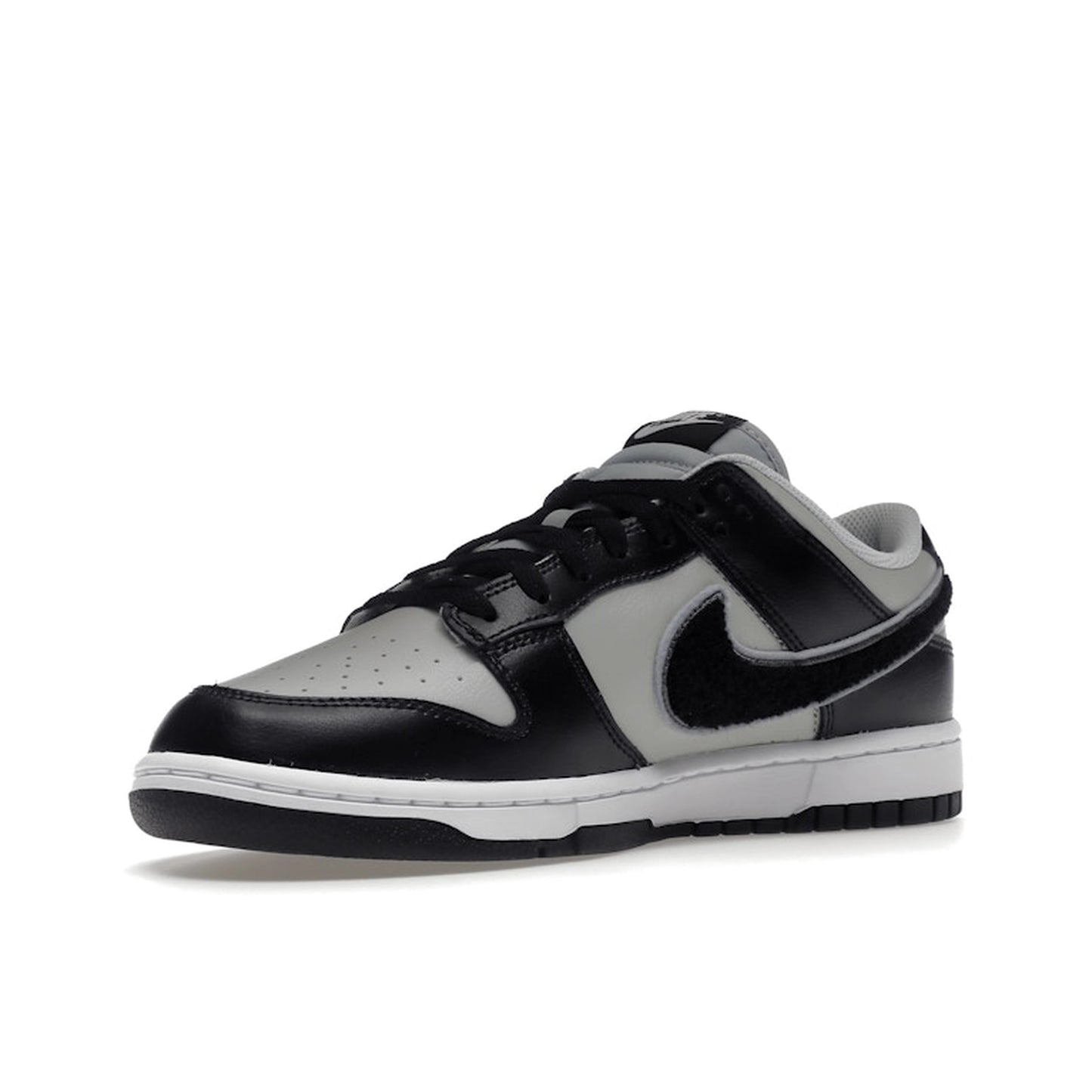 Nike Dunk Low Chenille Swoosh sneakers, front view, model DQ7683-001 in black and grey.