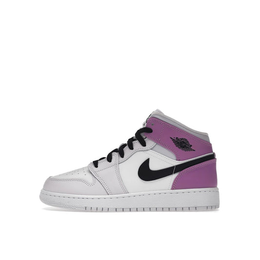 Jordan 1 Mid GS sneakers, side view, in barely grape with white and purple accents.