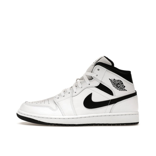 Jordan 1 Mid, side view, reverse panda edition in white leather with black accents and outsole.