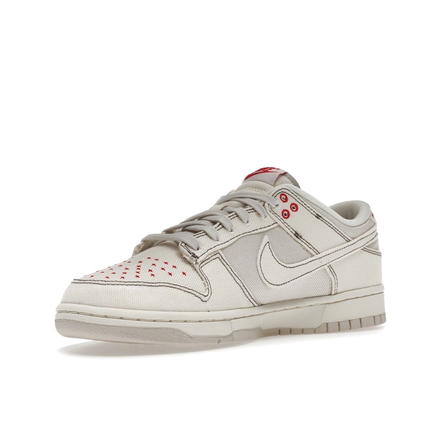 Nike Dunk Low Light Orewood Brown Sashiko sneakers, front view, model DV0834-100, in light orewood brown with sashiko details.