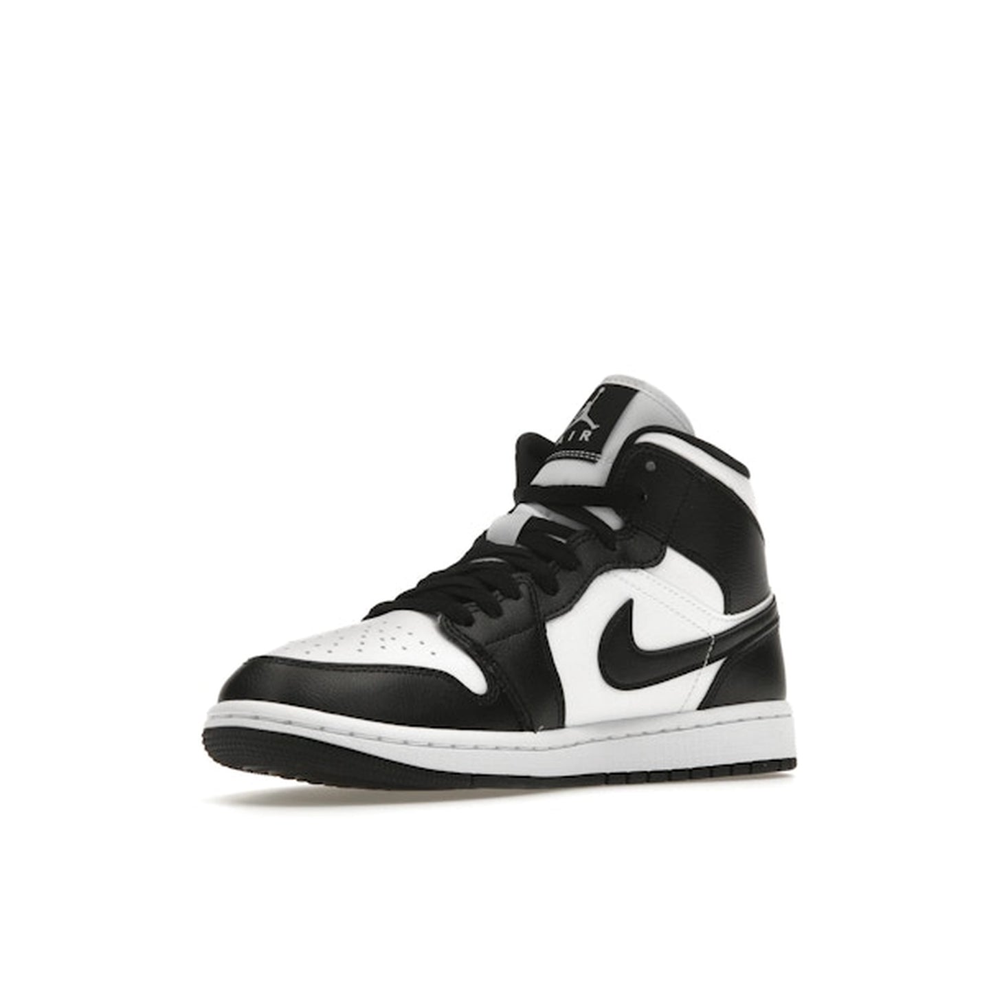 Jordan 1 Mid Women’s sneakers, front view, in white with black panda-style overlays.