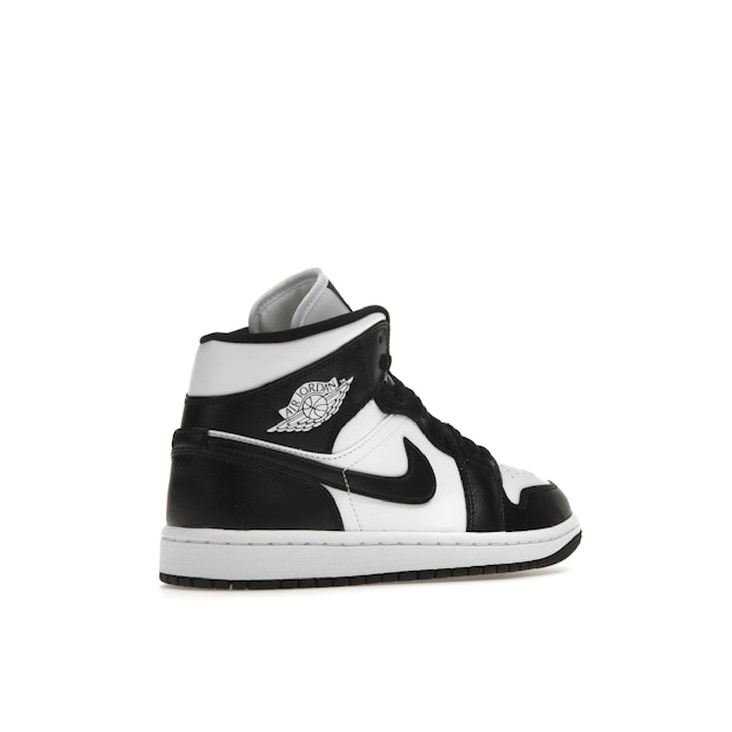 Jordan 1 Mid Women’s sneakers, back view, in white with black panda-style overlays.