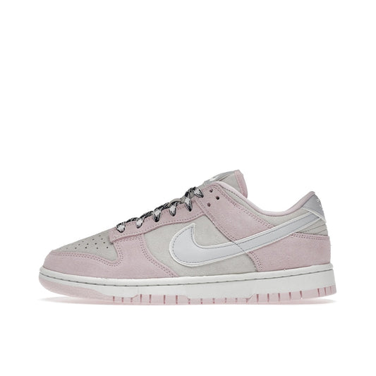 Nike Dunk Low LX Women's sneakers, side view, model DV3054-600 in pink foam with white details.