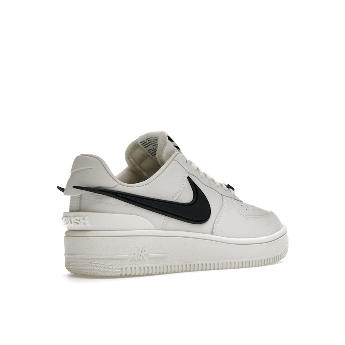 Nike Air Force 1 Low SP AMBUSH sneakers, back view, model DV3464-002, in Phantom white with black 3D swoosh.