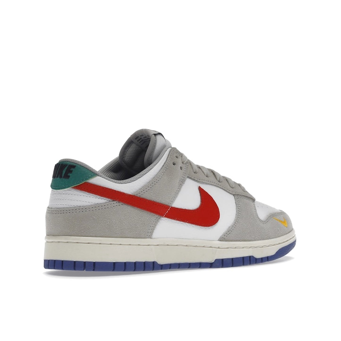Nike Dunk Low sneakers, back view, model DV3497-001 in light iron ore with red and blue details.