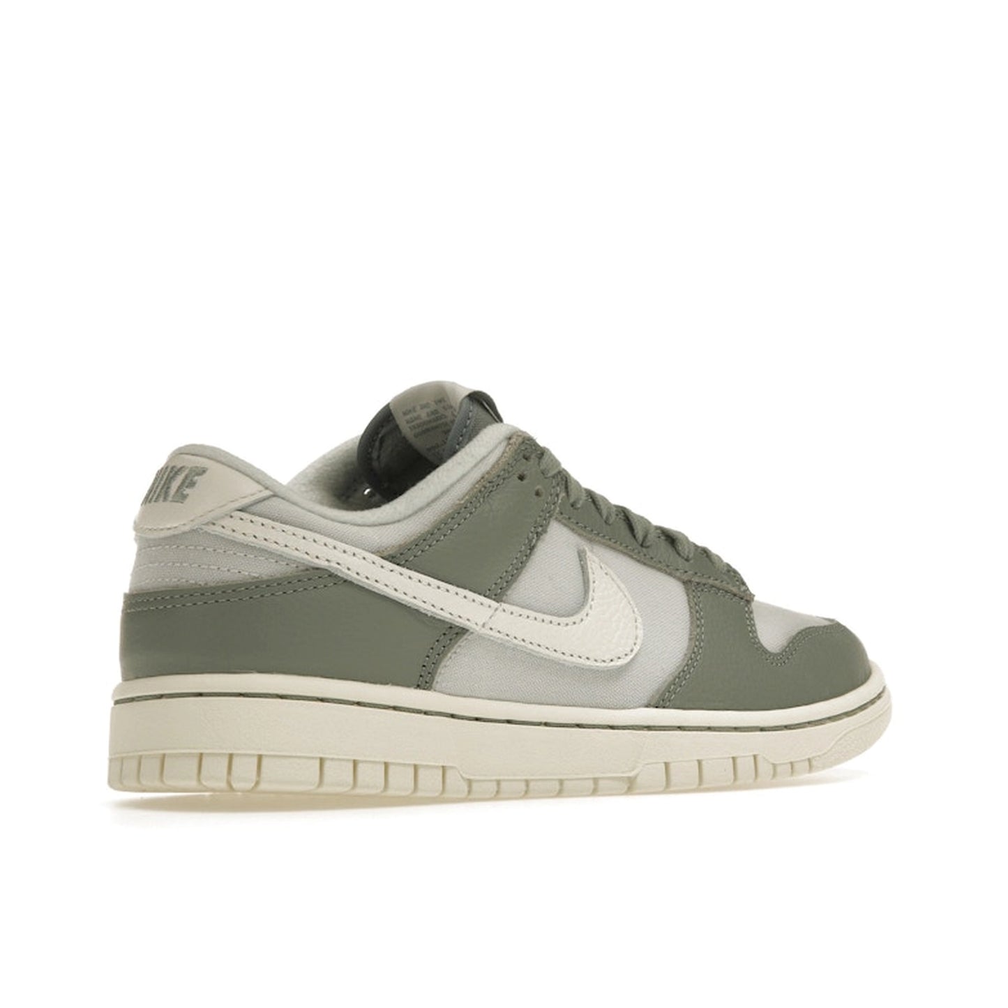 Nike Dunk Low sneakers, back view, model DV7212-300 in mica green with white and grey details.