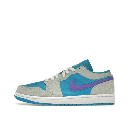 Jordan 1 Low SE Pistachio Frost Aquatone, side view, in minty green with blue accents.