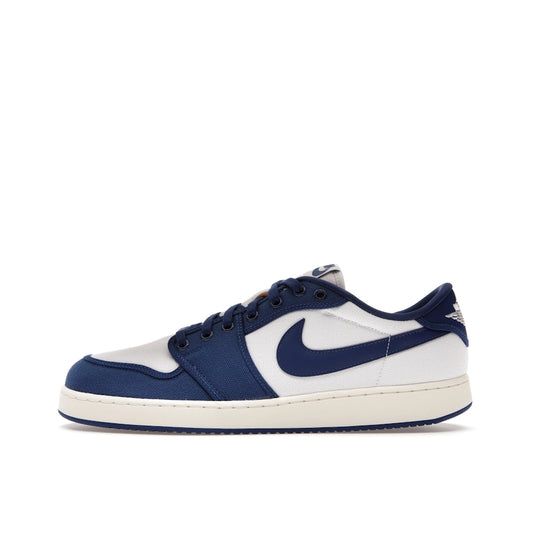 Air Jordan 1 Retro AJKO Low sneakers, side view, model DX4981-103, white and blue Kentucky colors.