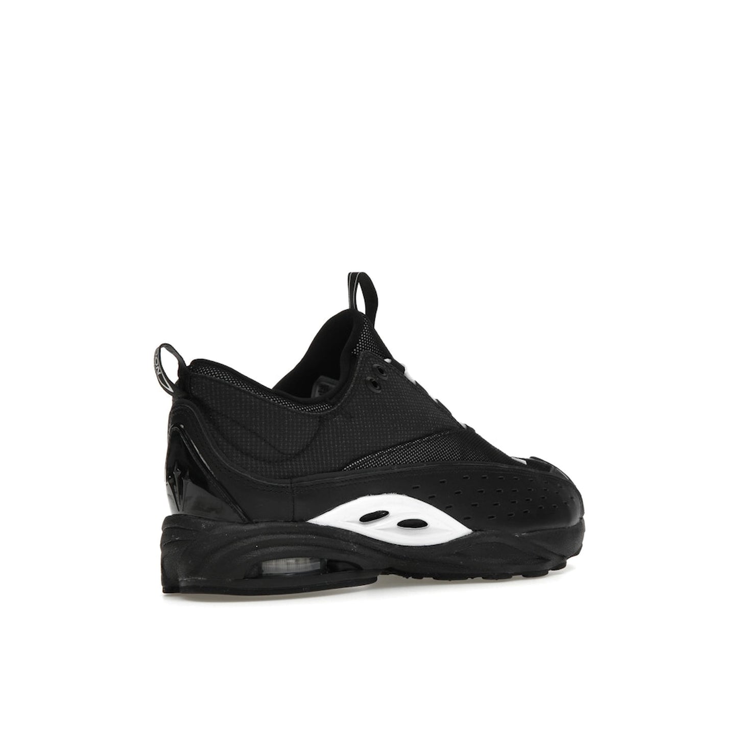 Nike Air Zoom Drive Drake NOCTA sneakers, back view, model DX5854-001 in black and white.