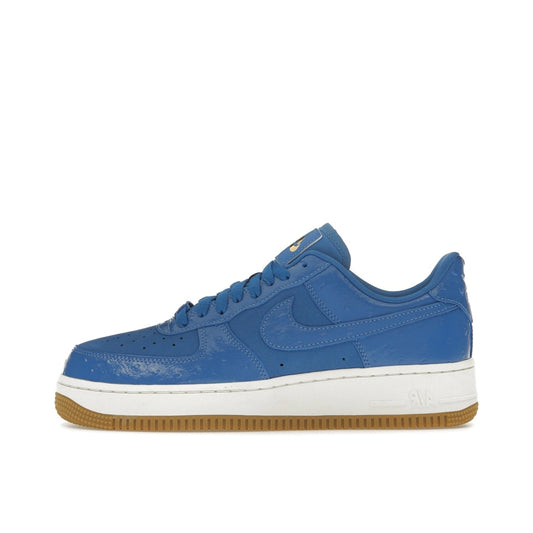 Nike Air Force 1 Low ’07 LX Blue Ostrich, side view, in deep blue with premium textured overlays.