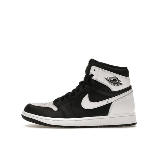 Jordan 1 Retro High OG sneakers, side view, model DZ5485-010, in black and white with classic styling.