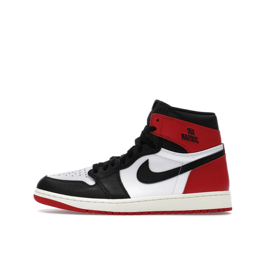 Jordan 1 Retro High OG sneakers, side view, in Black Toe Reimagined colorway.