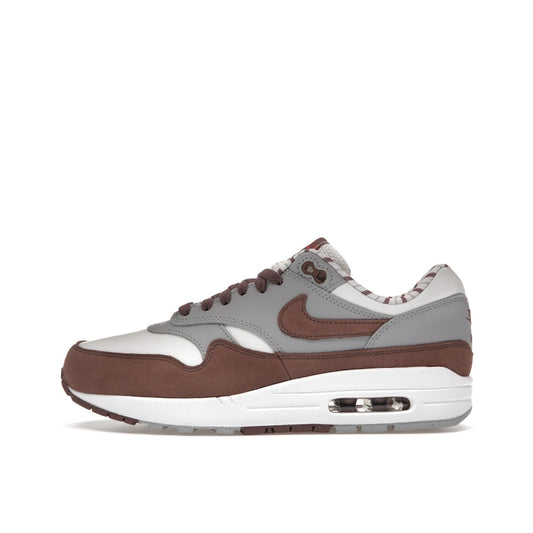 Nike Air Max 1 Premium Shima Shima 2023 sneakers, side view, model FB8916-100, brown with white and grey accents.