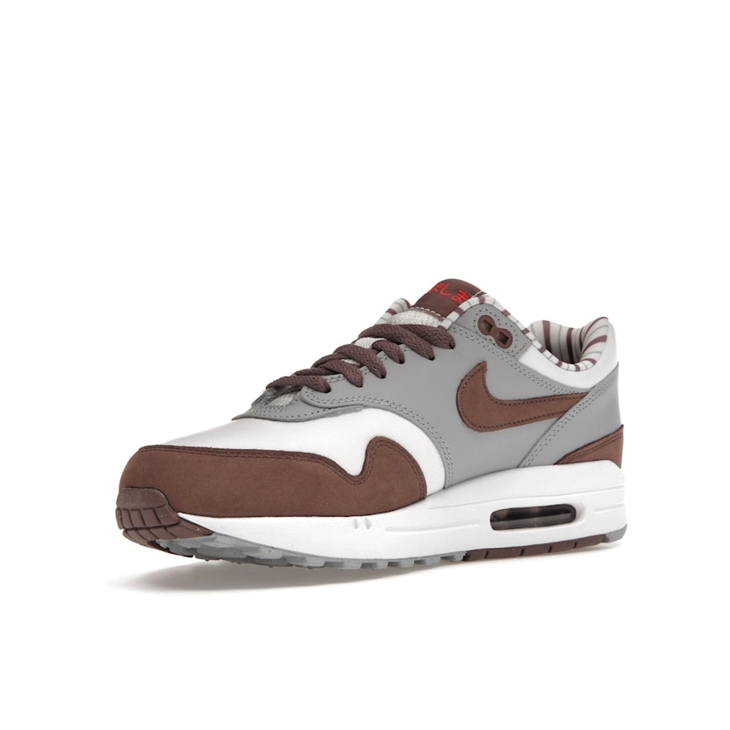 Nike Air Max 1 Premium Shima Shima 2023 sneakers, front view, model FB8916-100, brown with white and grey accents.