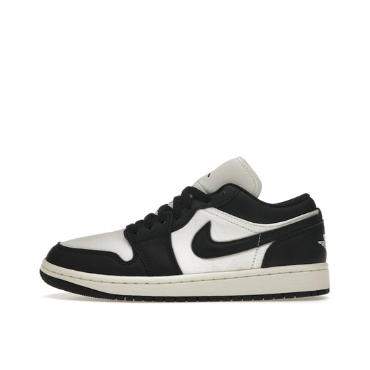 Air Jordan 1 Low SE Women’s sneakers, side view, in vintage black and white panda colorway.