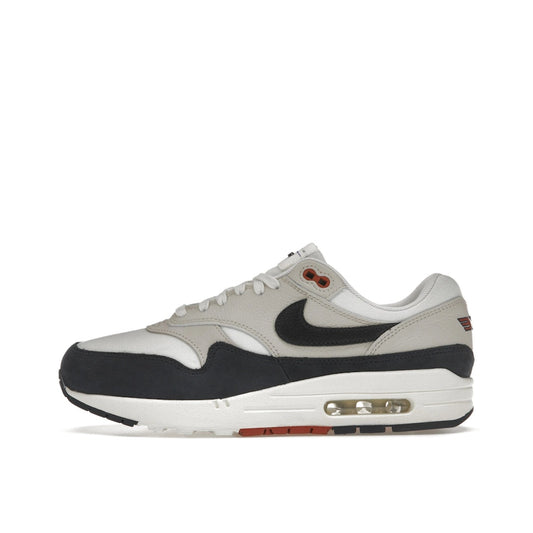 Nike Air Max 1 LX Obsidian Light Orewood Brown Women's sneakers, side view, model FD2370-110 in obsidian with light orewood brown accents.