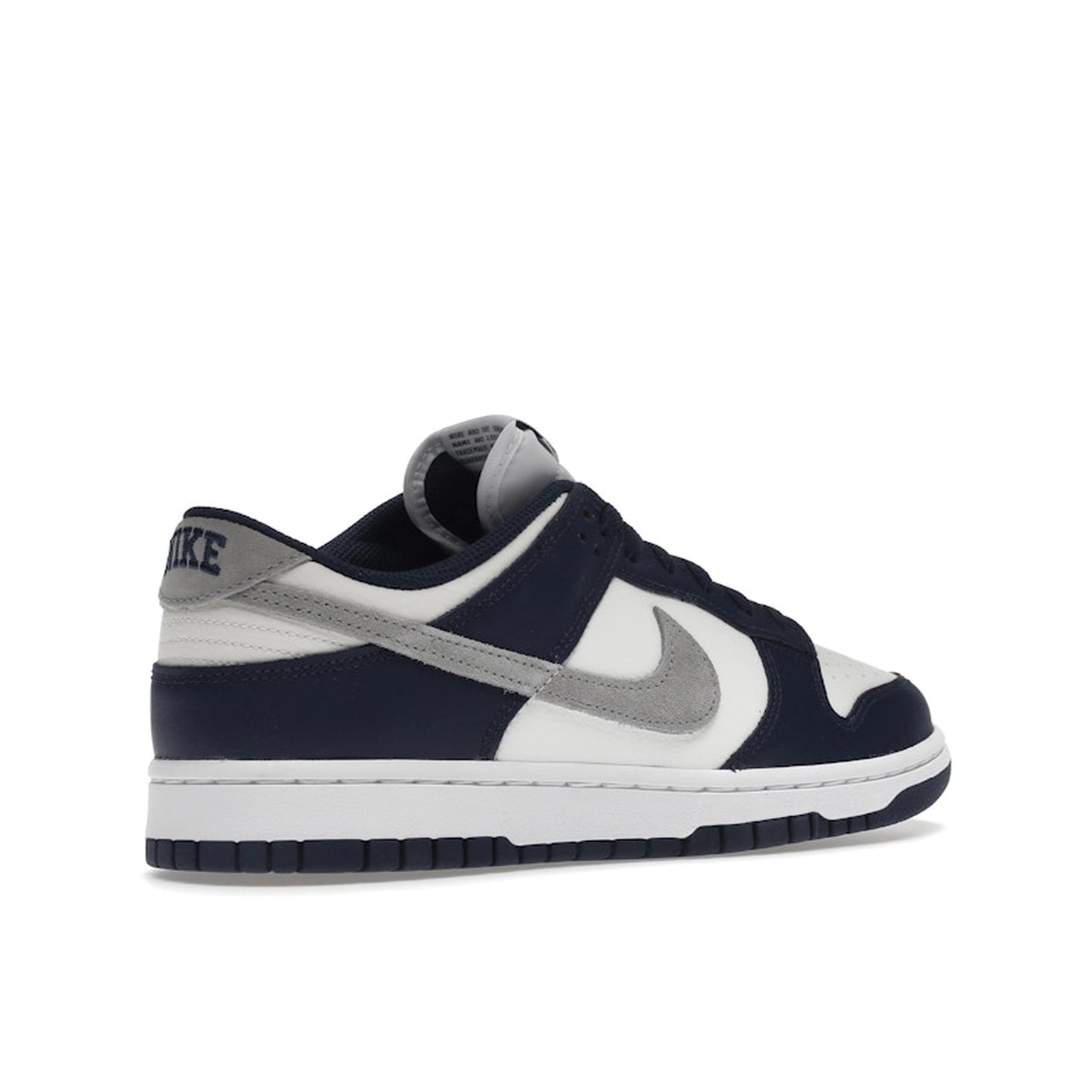 Nike Dunk Low Summit White Midnight Navy sneakers, back view, model FD9749-400 in white with navy accents.