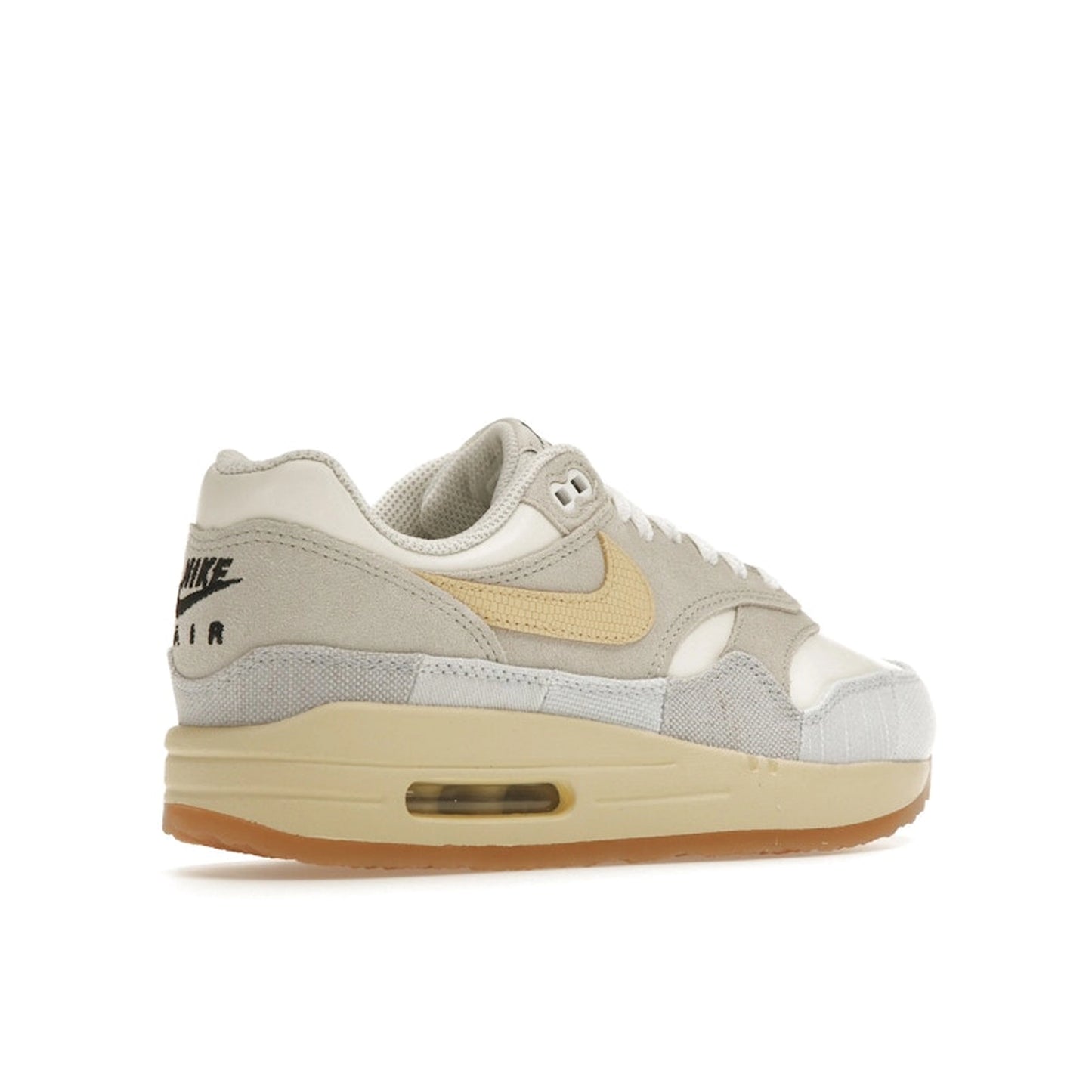 Nike Air Max 1 '87 Crepe sneakers, back view, model FJ4735-001, light bone with cream and beige accents.
