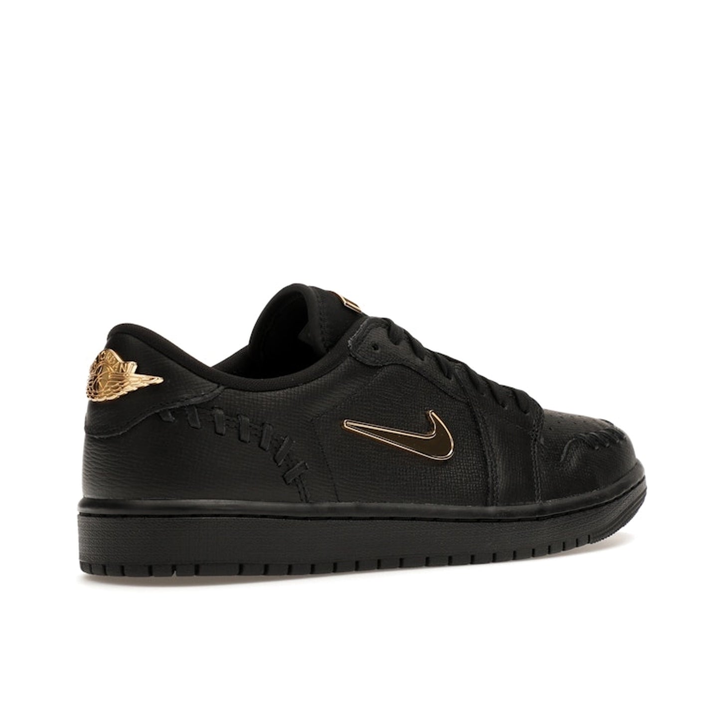 Jordan 1 Low Method of Make sneakers, back view, model FN5032-007, women's, black with metallic gold accents.