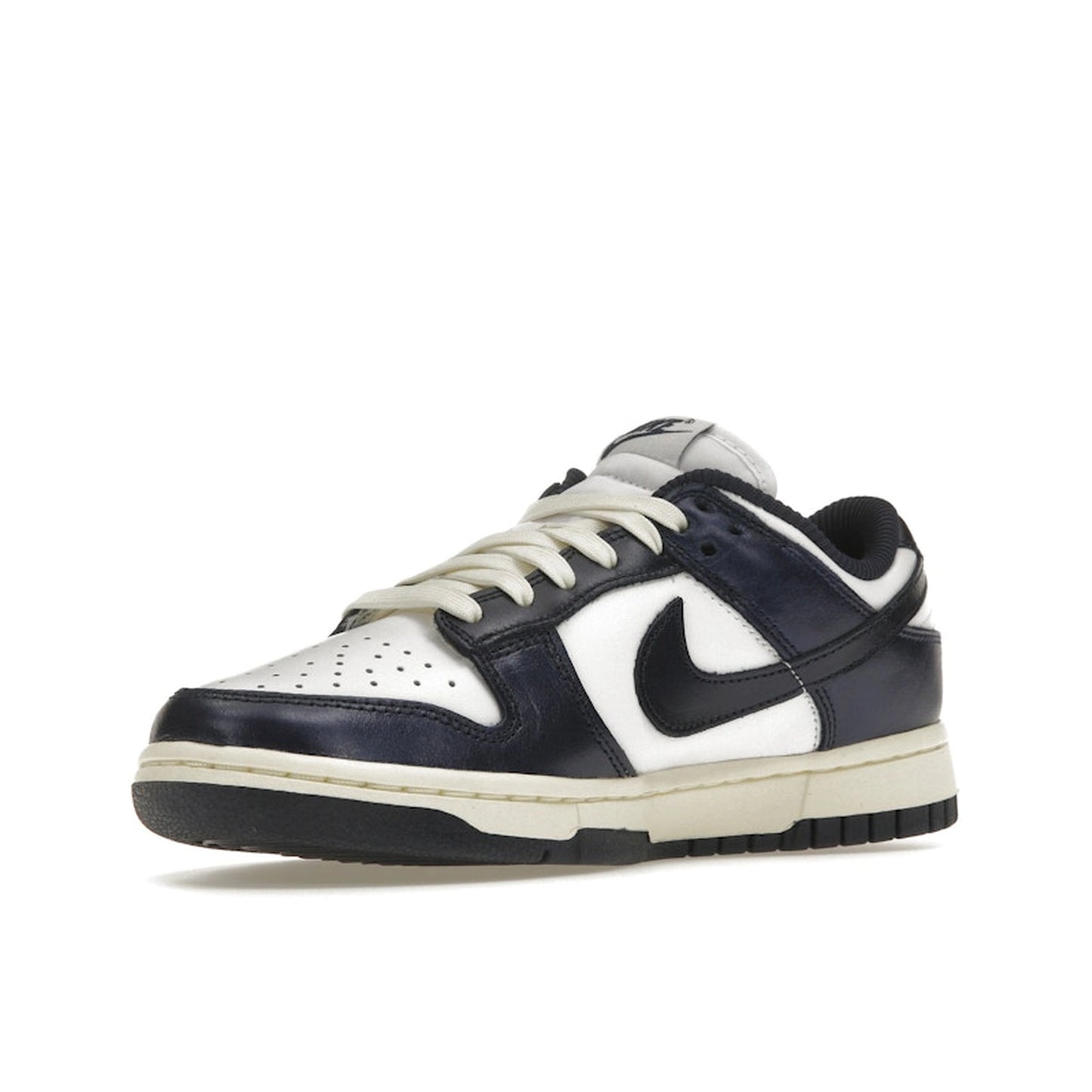 Nike Dunk Low PRM Women's sneakers, front view, model FN7197-100, in vintage navy with white accents.