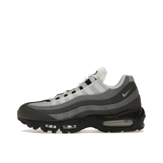 Nike Air Max 95 Jewel Swoosh sneakers, side view, model FQ1235-002, in grey with jewel swoosh detailing.