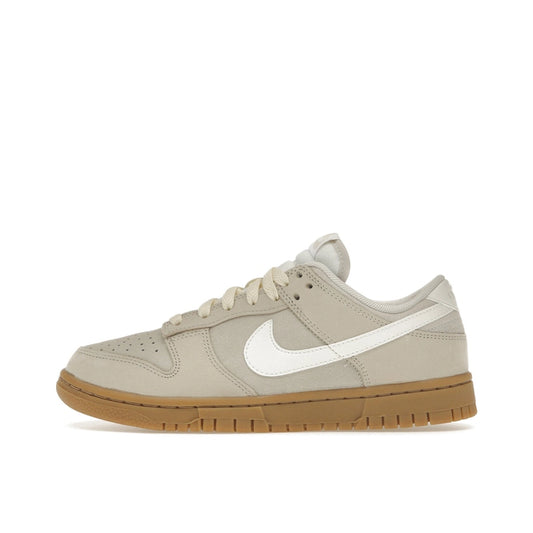 Nike Dunk Low SE Hangul Day Women's sneakers, side view, model FQ8147-104 in beige with gum sole and white details.