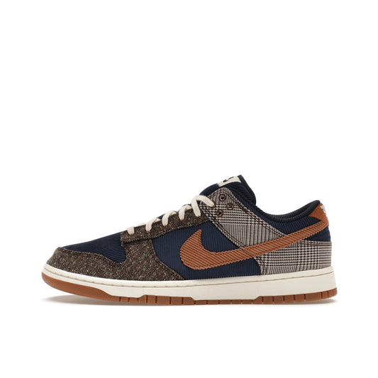 Nike Dunk Low Tweed, side view, in midnight navy with corduroy and tweed panels.