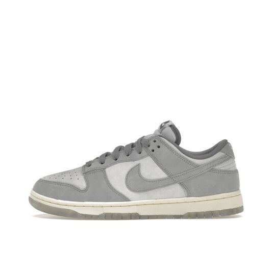 Nike Dunk Low Women's sneakers, side view, model FV1167-001, in cool grey with grey accents.