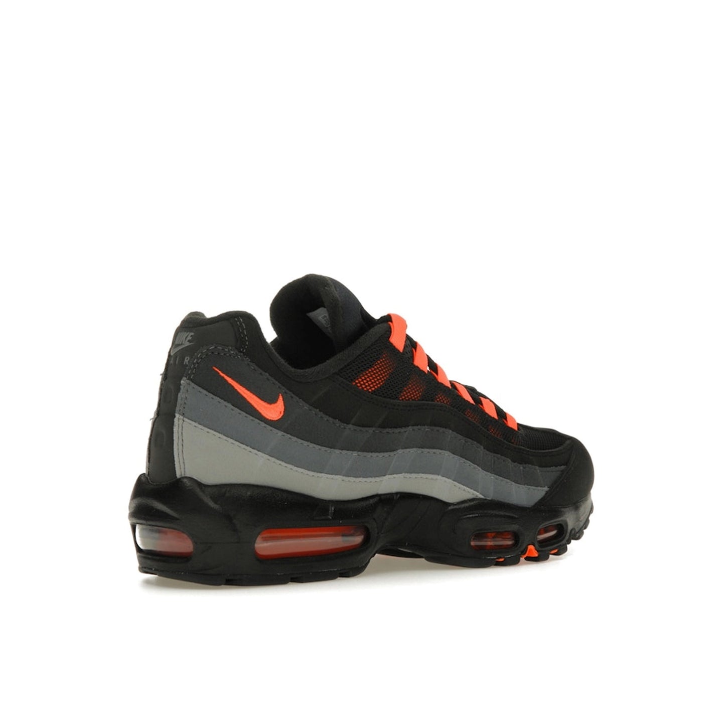 Nike Air Max 95 Black Hyper Crimson, back view, in mesh and suede with orange-red highlights.