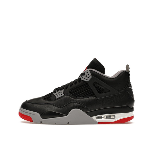 Air Jordan 4 Retro Bred Reimagined sneakers, side view, model FV5029-006, in black with red accents.
