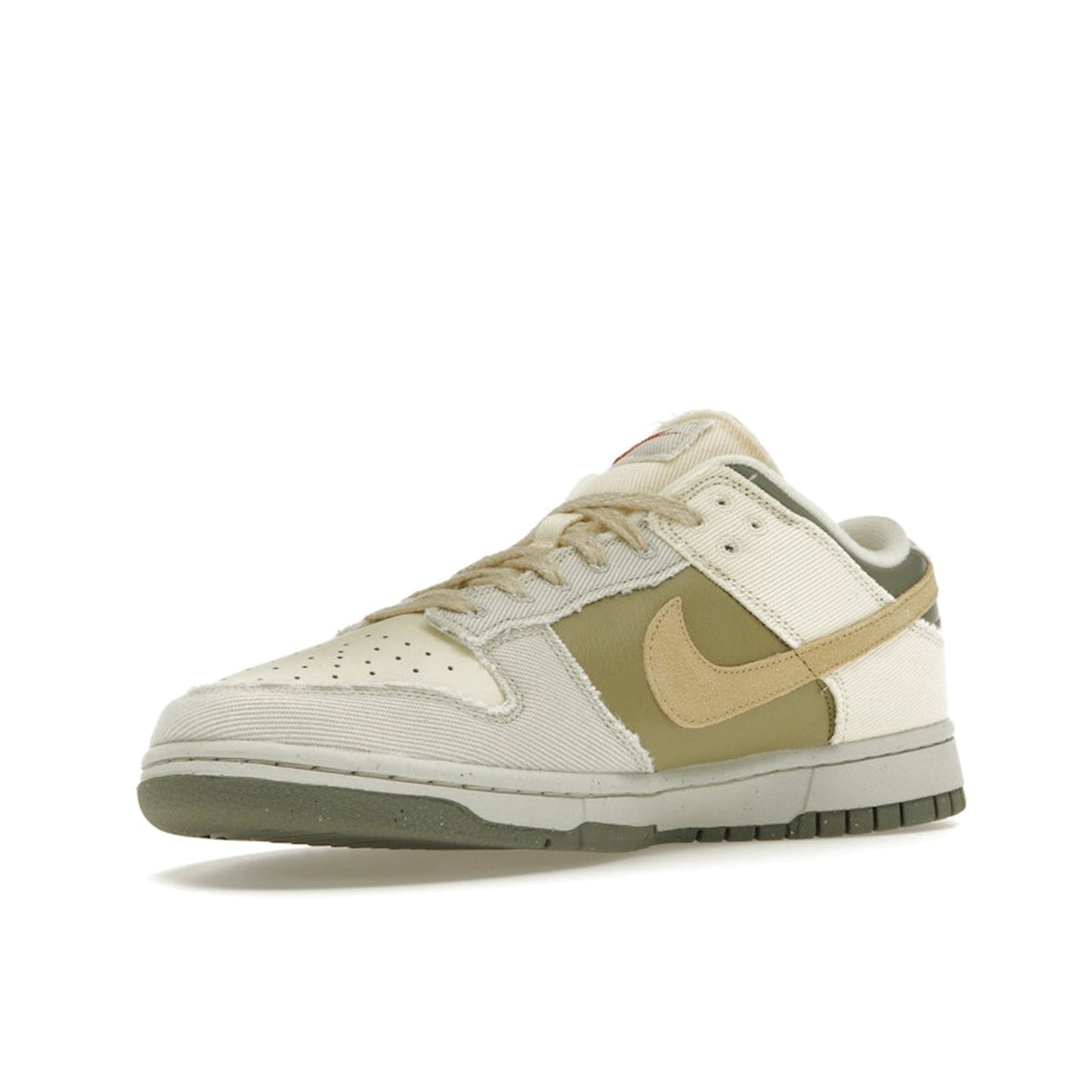 Nike Dunk Low Women's sneakers, front view, model FZ4341-100, in light bone with dark stucco and white accents.