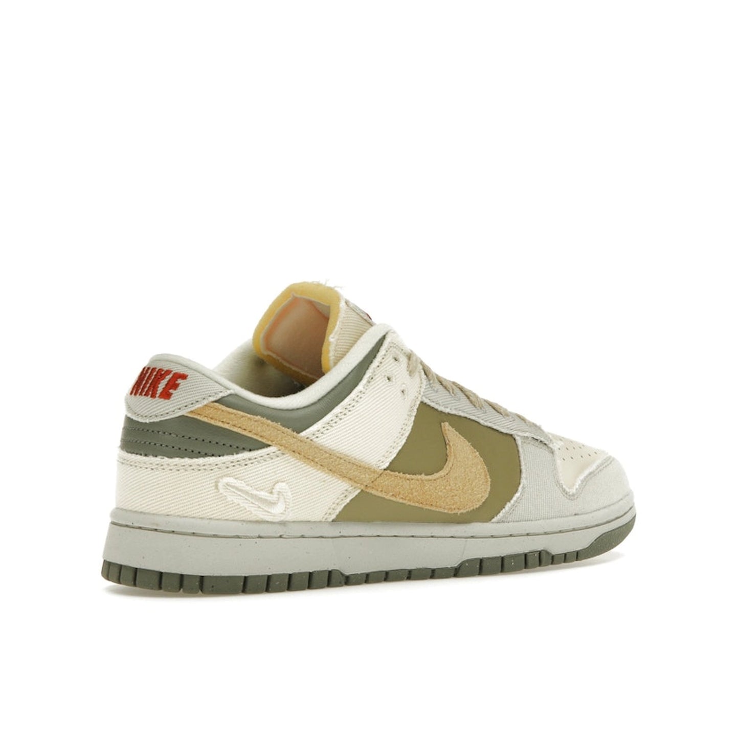 Nike Dunk Low Women's sneakers, back view, model FZ4341-100, in light bone with dark stucco and white accents.