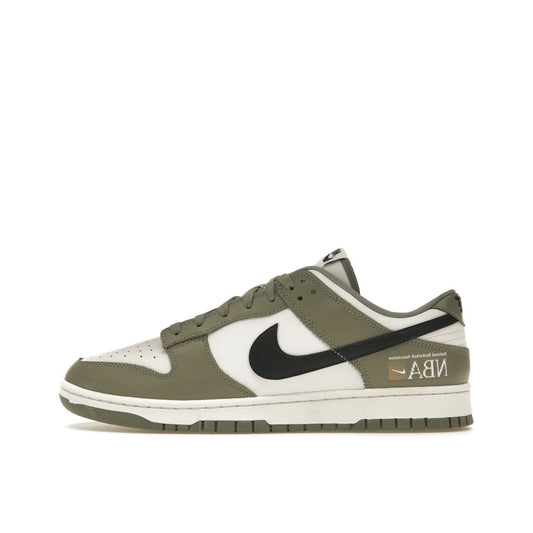 Nike Dunk Low NBA Paris sneakers, side view, model FZ4624-001 in grey and white.