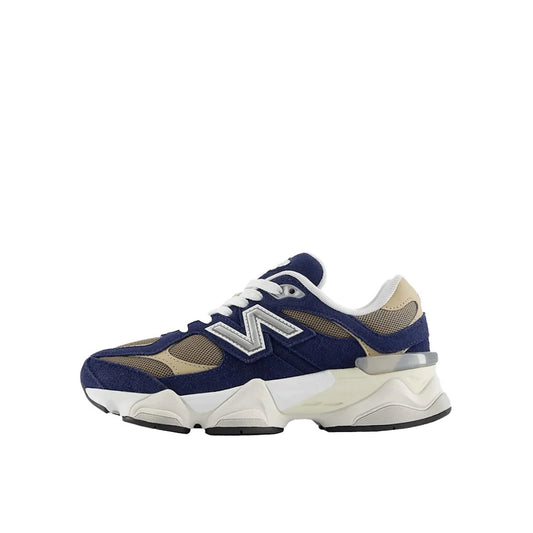 New Balance 9060, side view, in navy mesh with beige suede accents.