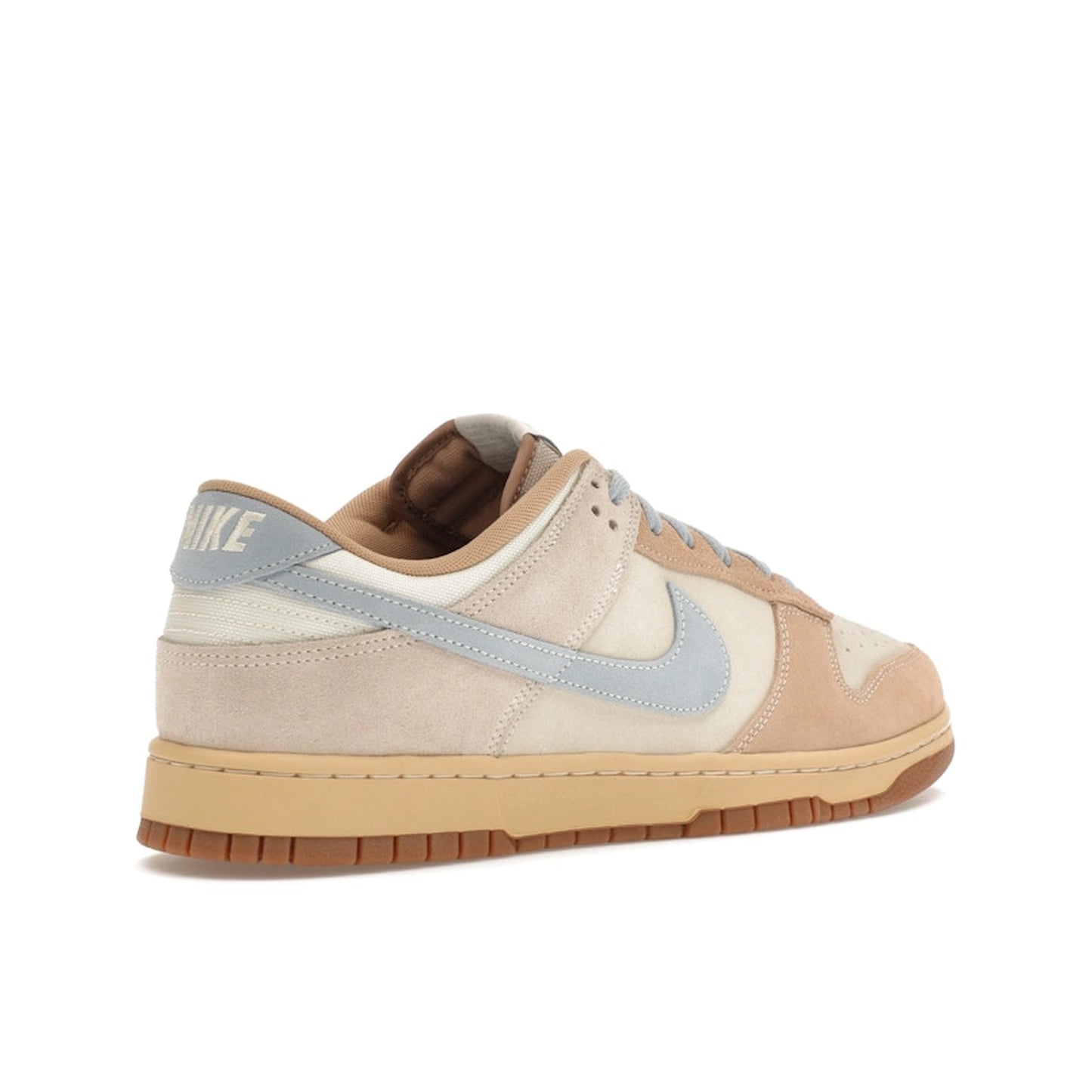 Nike Dunk Low Sanddrift sneakers, back view, model HF0106-100, in light armory blue with sanddrift and white accents.