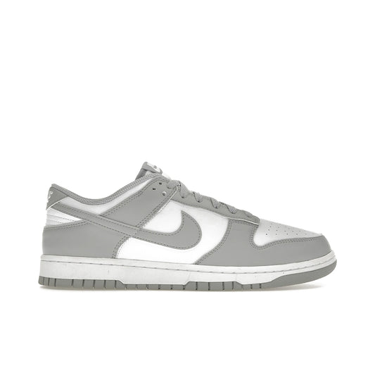 Nike Dunk Low unisex sneakers in white with light smoke grey accents, leather upper