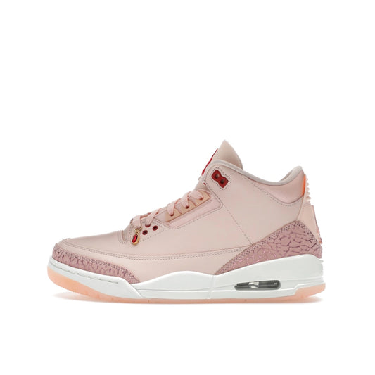 Air Jordan 3 Retro Valentine’s Day 2025, side view, in pink with elephant print overlays.